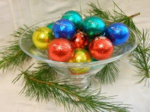 Holiday balls in dish white background (low)